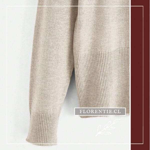 Detalle puños y dobladillo cardigan ajustado