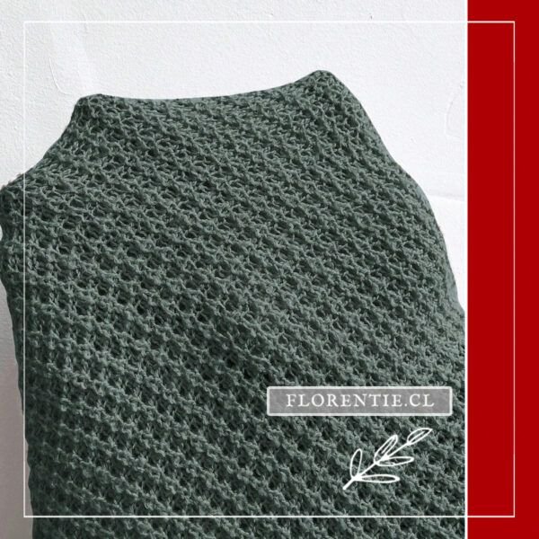 Detalle tejido sweater espalda descubierta