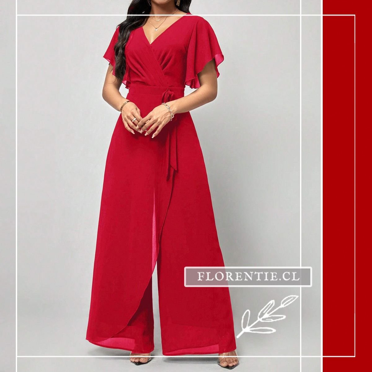 Vista frontal completa del enterito largo rojo de fiesta con escote en V wrap, mangas cortas con vuelo, cinturón de lazo y pantalón palazzo ancho con abertura decorativa