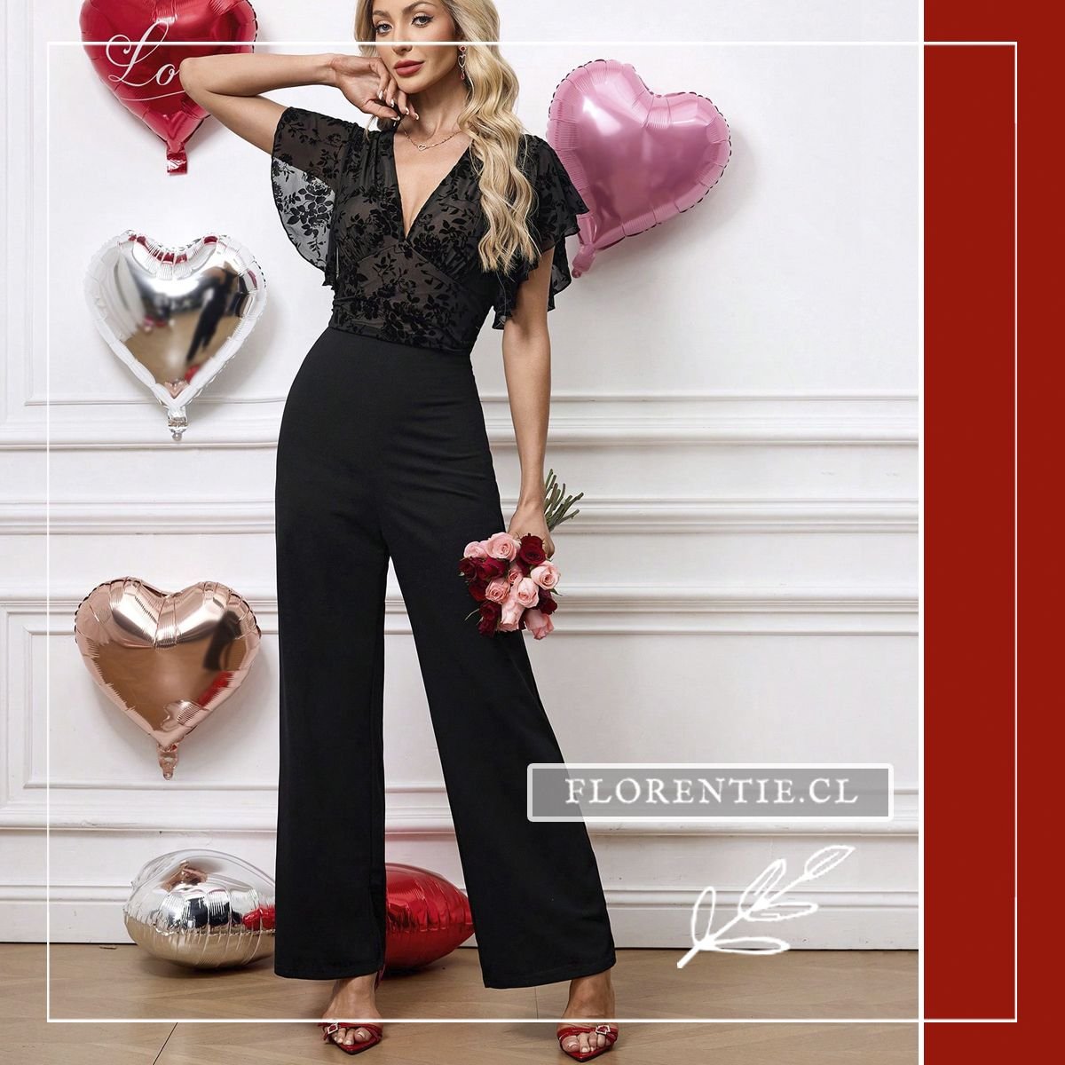 Vista frontal completa del enterito negro modelo Dana con top de malla floral en terciopelo, mangas flutter, escote en V cruzado y pantalón palazzo ancho elasticado