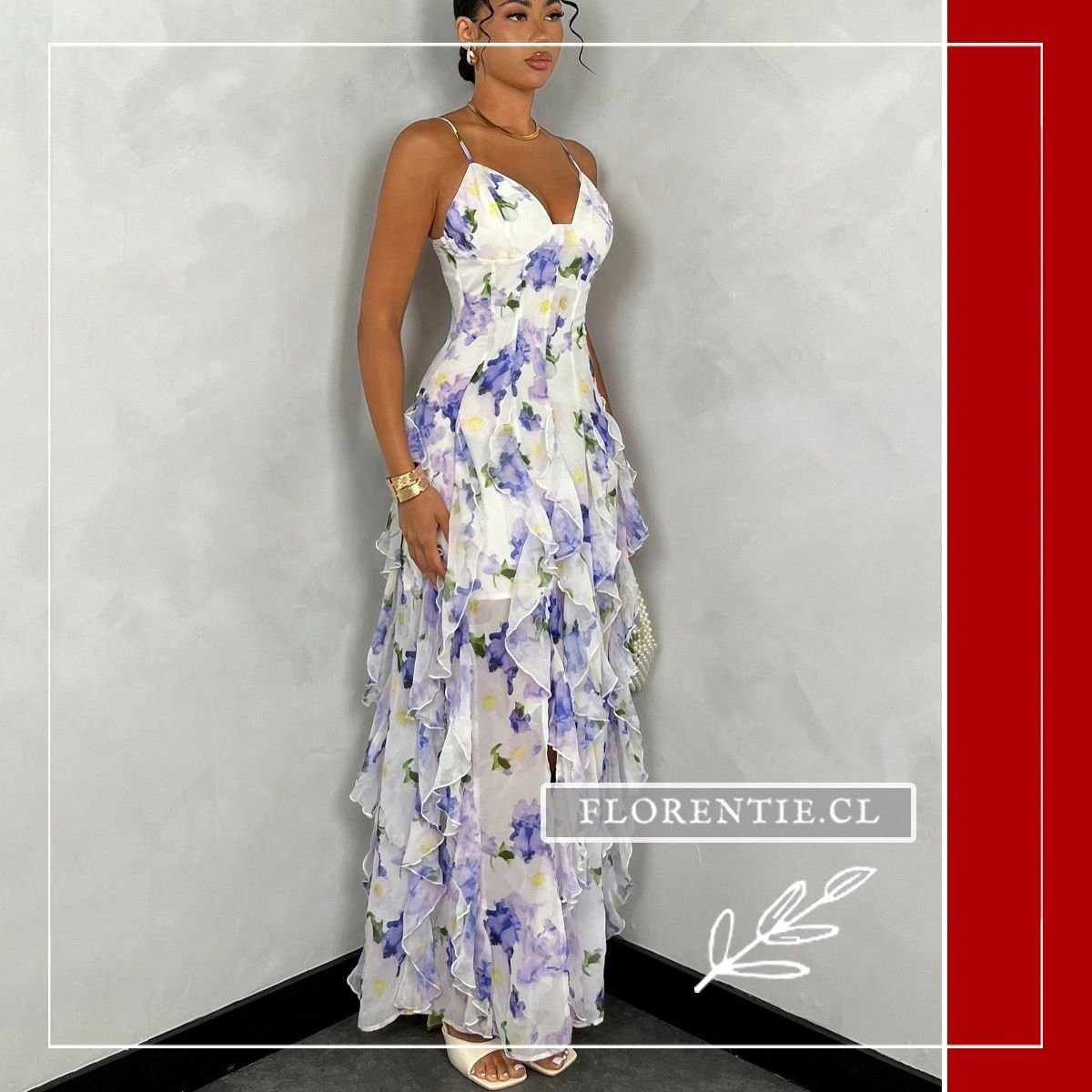 Vista frontal completa del vestido maxi estampado floral frío en gasa con escote corazón, tirantes finos y falda de múltiples vuelos en cascada sobre fondo neutro.